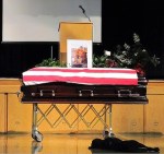 A dog mourns his owner